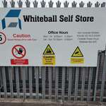 An image of whiteball self storage 2025 entrance sign